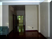 Kitchen table looking down hall