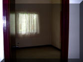 End of hallway into big room